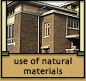 Features of Prairie School Architecture: Use of brick, wood, stucco and other natural materials